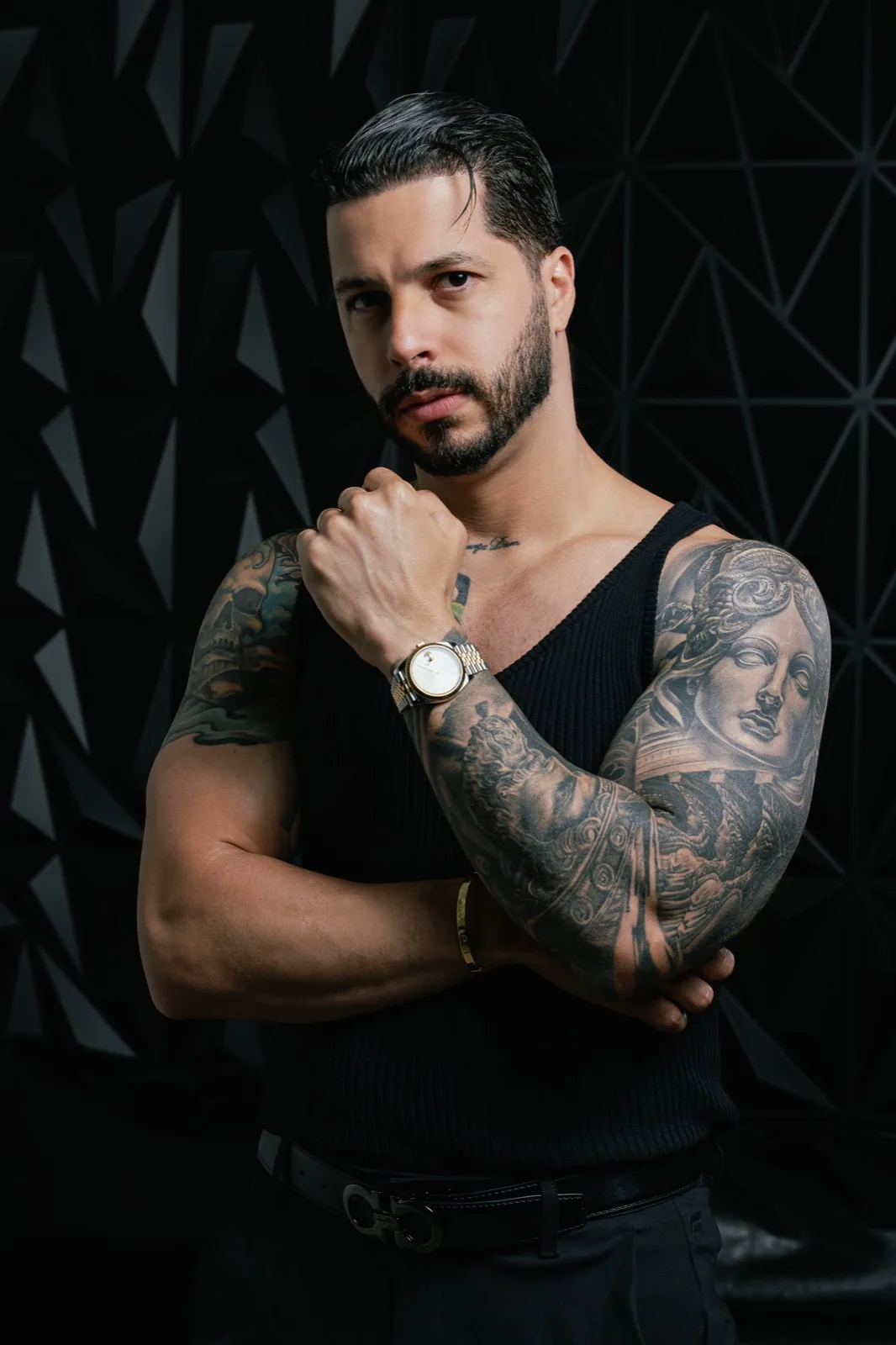 Portrait of tattoo artist Yasmany Tattoo Pro at work, Tampa tattoo studio